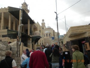 Walking to the traditional site of Lazarus' Tomb in Bethany