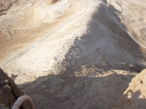 Looking downward at remains of the earthen ramp built by the Romans to re-capture Masada from Zealots.